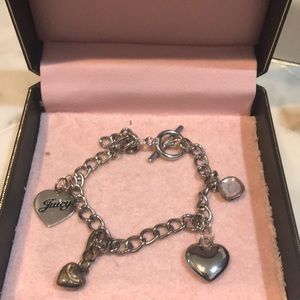 Juicy Couture bracelet with four charms included